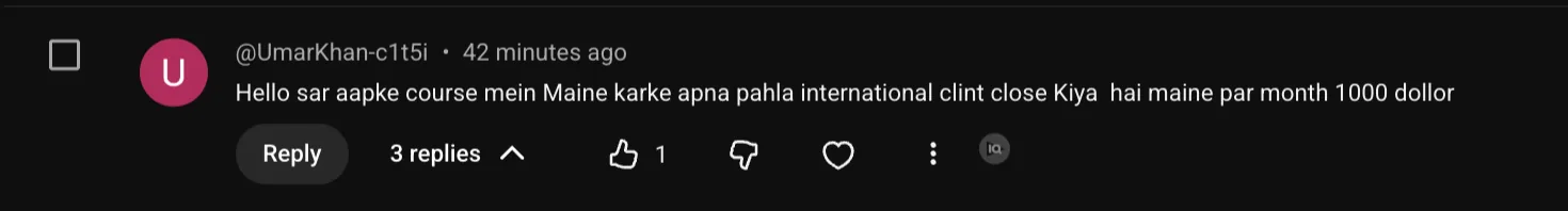 YouTube comment from paid course learner Umar Khan about closing his first international client at one thousand dollars per month